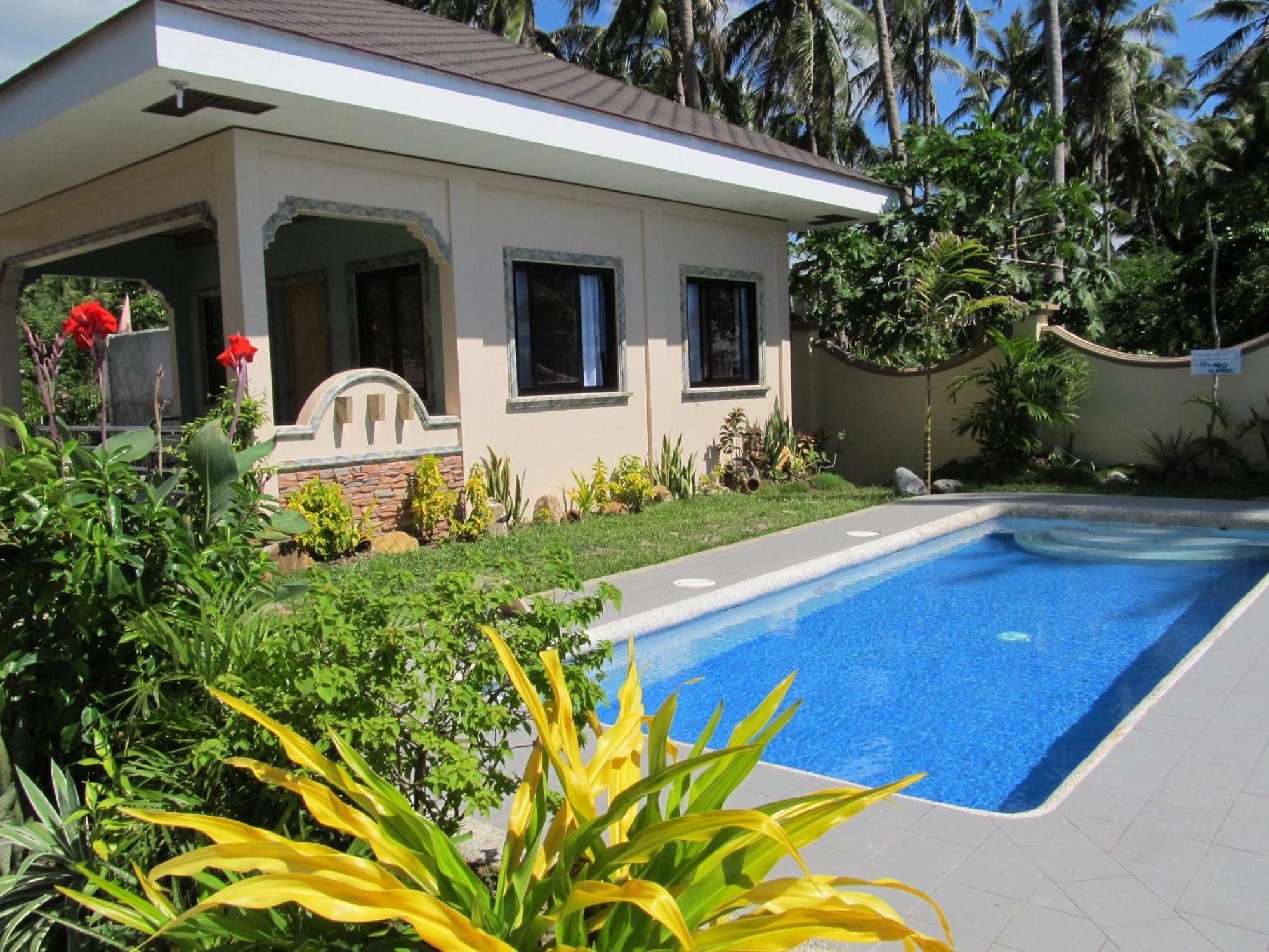 Ucoy Beach Resort Libertad Extérieur photo
